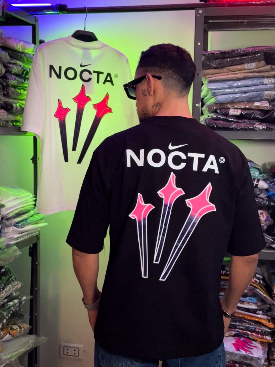 Polera Nike Nocta Colorido negra