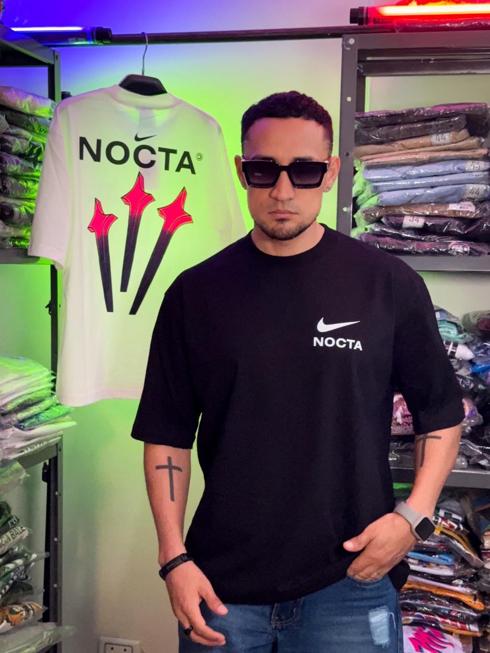 Polera Nike Nocta Colorido negra
